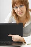 girl in glasses with a laptop