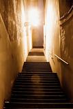 prague - narrow stairway illuminated with gas lanterns at mala strana