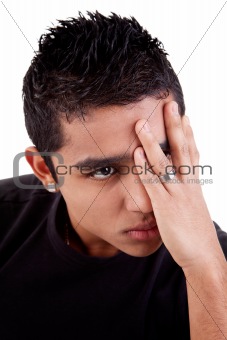 young latin man, pensive, with his hand on front of eyes , isolated on white background, studio shot