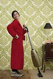 Bathrobe retro housewife woman vacuum cleaner