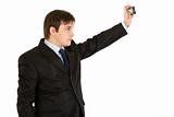  Modern young businessman photographing himself
