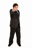 Confident modern businessman pointing finger at you
