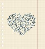 Sketch of floral heart ornament on notebook sheet