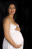 sexy beautiful pregnant Indian woman in white dress