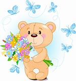 Blue Teddy Bear with flowers