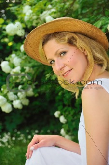 Young woman resting in garden