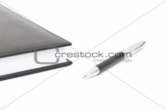 black leather Notebook and pen