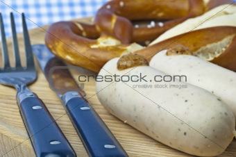 veal sausage with pretzel and sweet mustard