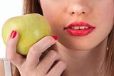 The green apple and red lips