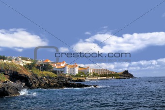Resort by a rocky beach in Canico de Baixo