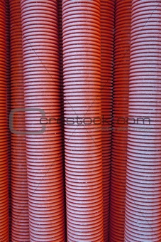 Red plastic pipes