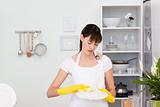 Woman washing dishes