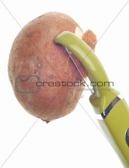 Sweet Potato Being Peeled