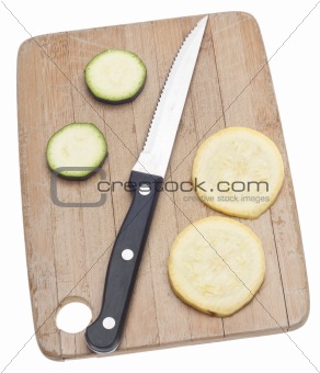 Sliced Yellow Squash on a Wooden Chopping Block