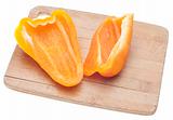 Sliced Orange Bell Peppers on a Wooden Chopping Block