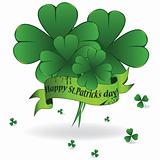 Background to St. Patrick's Day with clover and ribbon