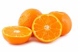 Full and sliced ripe tangerines 