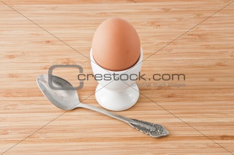 Egg on a stand with a spoon