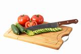 Cutting Board  with three tomatoes
