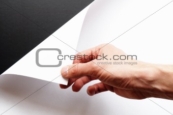hand turning paper