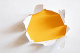 yellow hole in paper