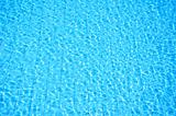 blue swimming pool with ripple water