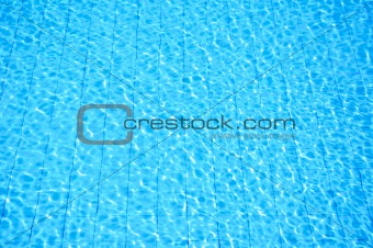 blue swimming pool with ripple water