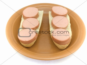 Two sandwiches with sausage