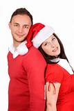 young couple brunette in red christmas clothes