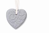 Grey stone heart on white