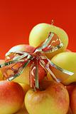 yellow ripe apples with a ribbon