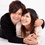 Happy young woman and man smiling together