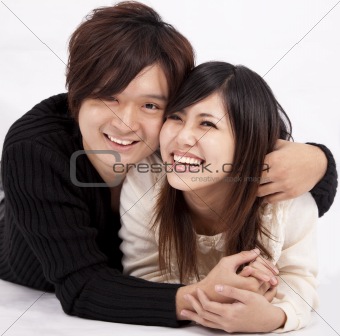 Happy young woman and man smiling together
