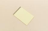 yellow note book with lots