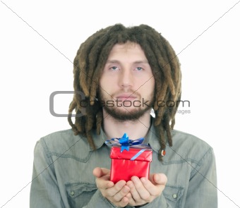 Young Man giving a gift isoated