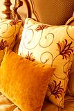 Colorful cushions on the bed