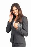 Beautiful brunette businesswoman talking on her cellphone