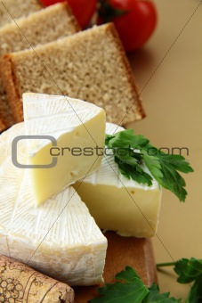 delicatessen soft cheese with bread, tomatoes