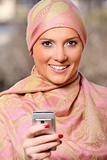 Arabic businesswoman with a cell phone