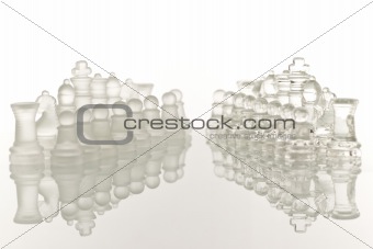 Close-up of glass chess on a glass countertop
