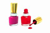 Spilled Red and Pink Nail Polish with brush isolated on white