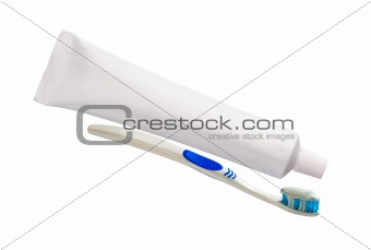 toothpaste and brush isolated on white background