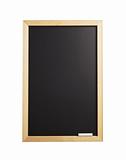 empty blackboard with wooden frame and chalks isolated on white