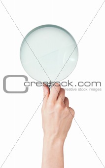 Woman hand with magnifier isolated on white background