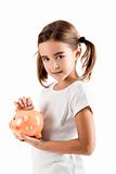 Little girl with a piggy-bank
