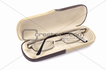 Glasses in spectacle case on white background