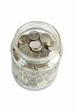 glass jar with silver coins