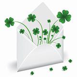 Open envelope with clover