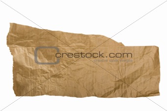 Piece of brown paper, torn on white