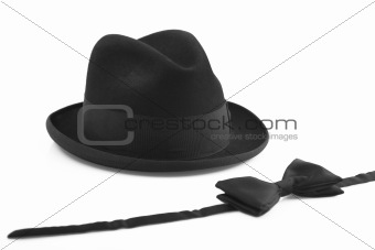 black vintage hat and bow-tie on white background